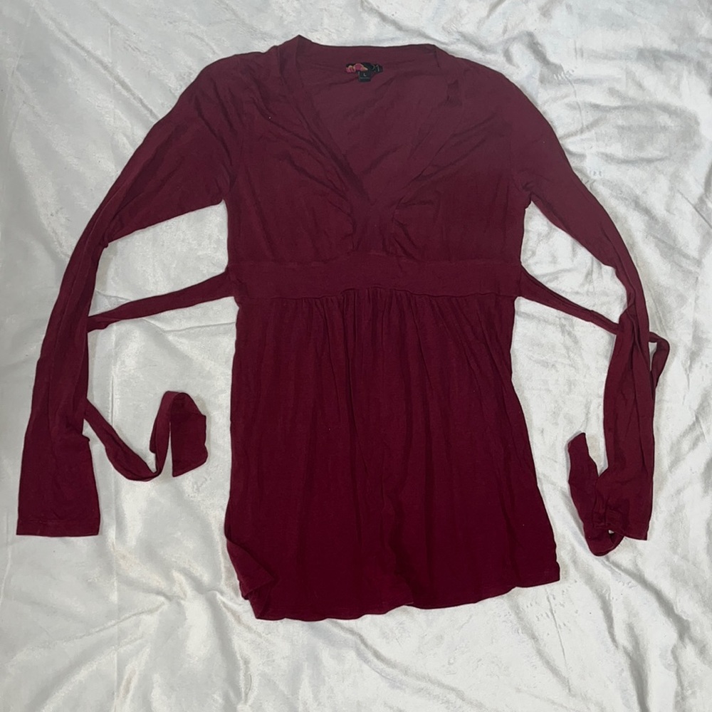 Burgundy colored top with tie
